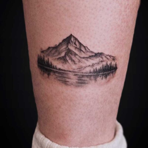 black-grey-realism-tattoo-mountain