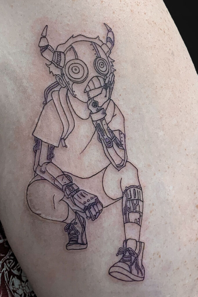 Line-art tattoo of a crouching cyborg with horned helmet and gas-mask face, wearing a hoodie and sneakers.