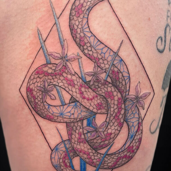 Intricate tattoo of two pinkish snakes entwined around blue geometric lines and purple flowers inside a diamond frame.