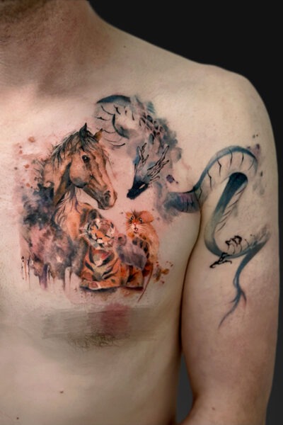 Watercolour & Ink Wash tattoo by Luu at Atticus Tattoo, Calgary