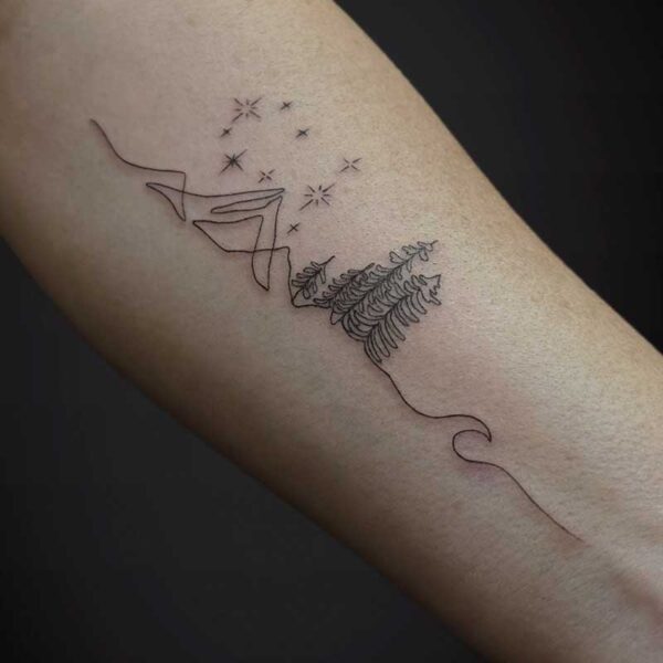 fineline-tattoo-mountains-trees-stars