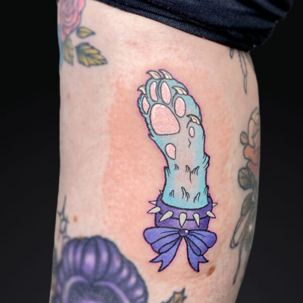 neotraditional-tattoo-cat-paw-ribbon