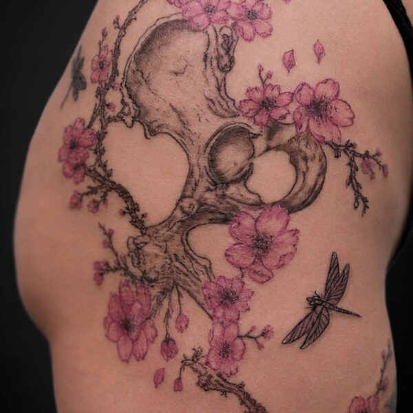 realims-tattoo-hip-bones-blossoms