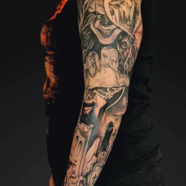 julia black and grey horror sleeve tattoo Black and grey horror themed full sleeve tattoo by Julia at Atticus Tattoo, Calgary