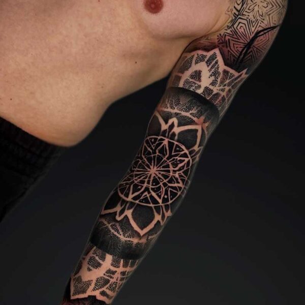 julia geometric mandala sleeve tattoo Geometric blackwork mandala full sleeve tattoo by Julia at Atticus Tattoo, Calgary