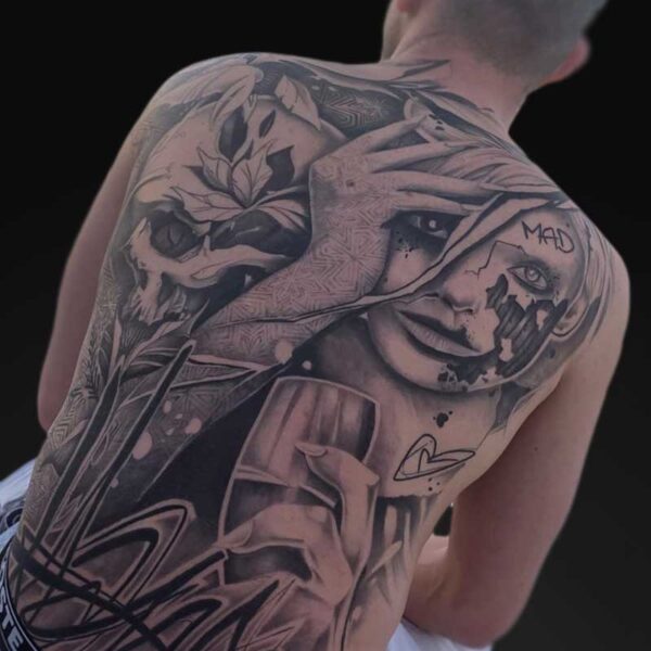 julia graphic realism back piece tattoo Graphic realism full back piece tattoo with woman, skull and brush strokes by Julia at Atticus Tattoo, Calgary