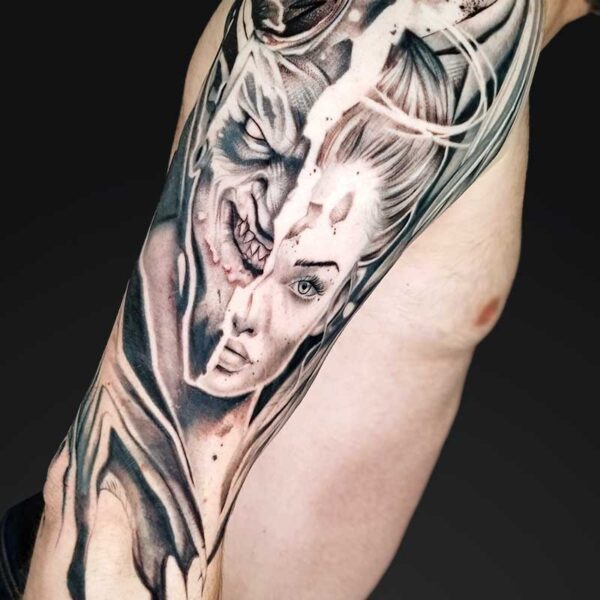julia graphic realism devil and woman tattoo Graphic realism devil and woman split face half sleeve tattoo by Julia at Atticus Tattoo, Calgary