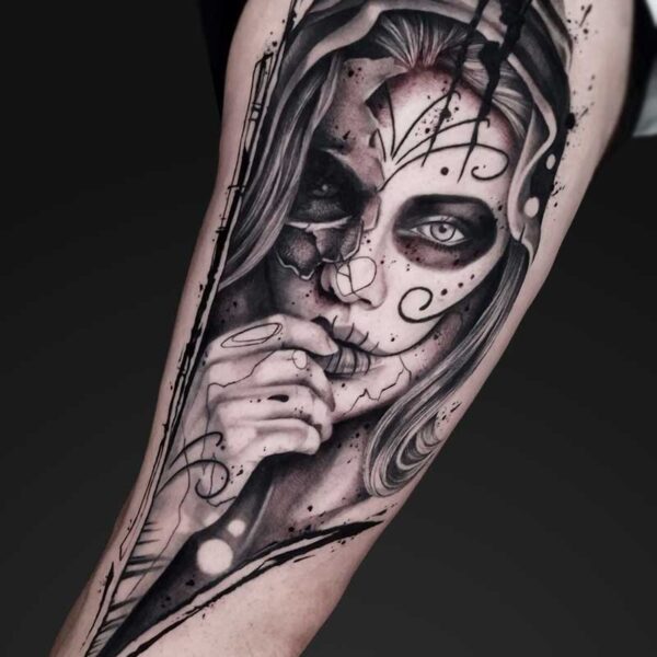 julia graphic realism sugar skull tattoo Graphic realism sugar skull woman tattoo with brush strokes by Julia at Atticus Tattoo, Calgary