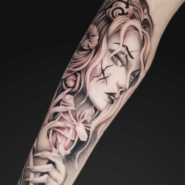 julia graphic realism woman and roses tattoo Graphic realism woman and roses forearm tattoo by Julia at Atticus Tattoo, Calgary