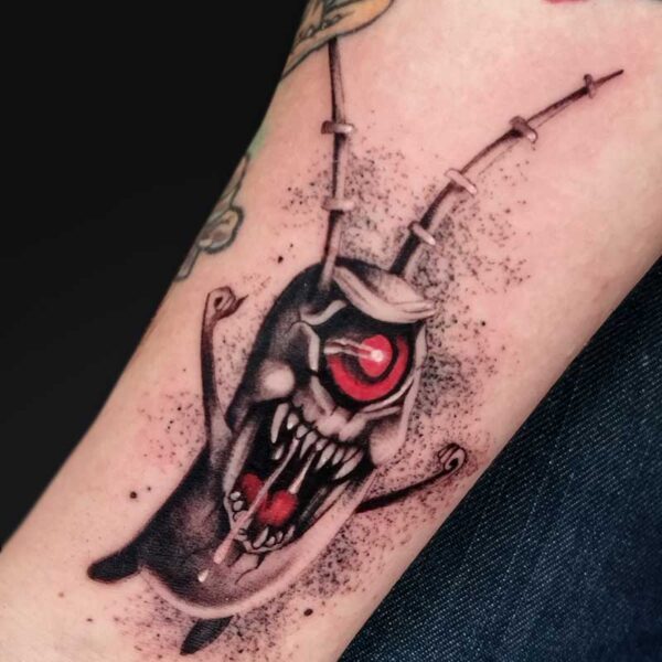 julia graphic red eye cartoon monster tattoo Graphic cartoon monster tattoo with red eye accent by Julia at Atticus Tattoo, Calgary