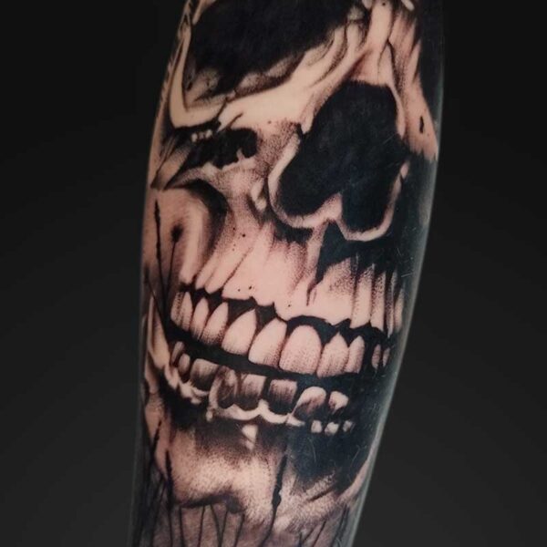 julia graphic skull forearm tattoo Graphic blackwork skull forearm tattoo by Julia at Atticus Tattoo, Calgary