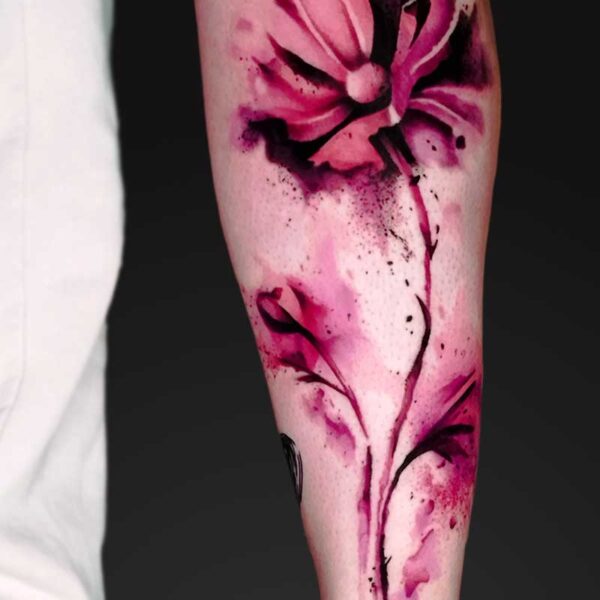 julia watercolour flower forearm tattoo Watercolour pink flower forearm tattoo by Julia at Atticus Tattoo, Calgary
