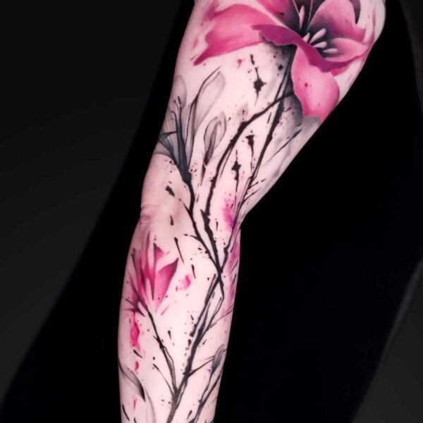 julia watercolour flower sleeve tattoo Watercolour pink flower full sleeve tattoo by Julia at Atticus Tattoo, Calgary