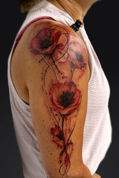 Watercolour & Ink Wash tattoo by Kat at Atticus Tattoo, Calgary